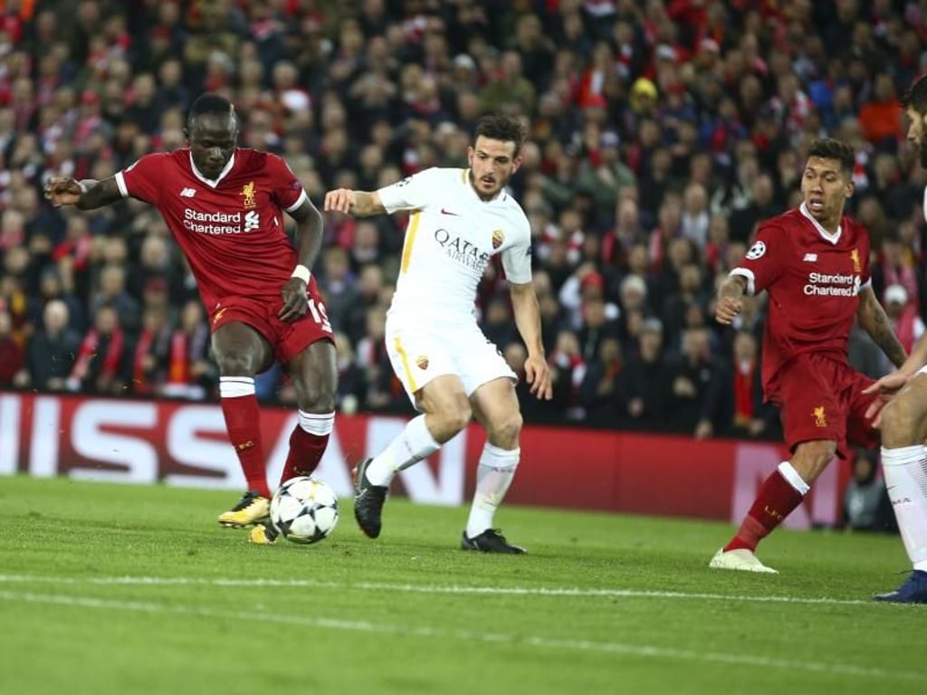 Sadio Mane (l) macht das 3:0 für den FC Liverpool klar. Foto: Dave Thompson/AP