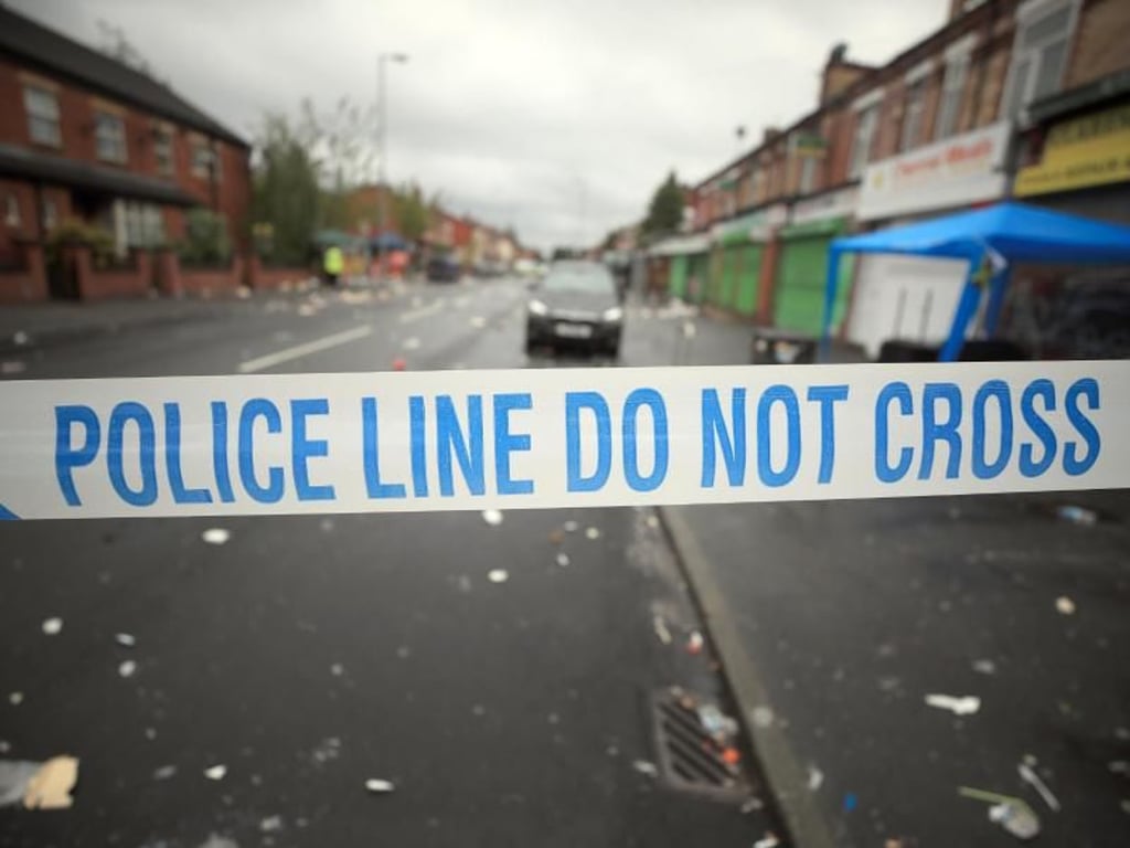 Absperrband der Polizei an einem Tatort in Manchester. Foto: Peter Byrne/PA Wire/Archiv