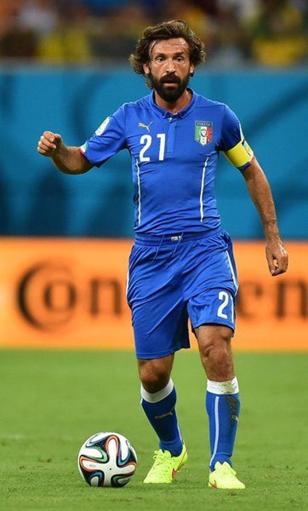 Italy's midfielder Andrea Pirlo runs with the ball during a Group D football match between England and Italy at the Amazonia Arena in Manaus during the 2014 FIFA World Cup on June 14, 2014. AFP PHOTO / BEN STANSALL
