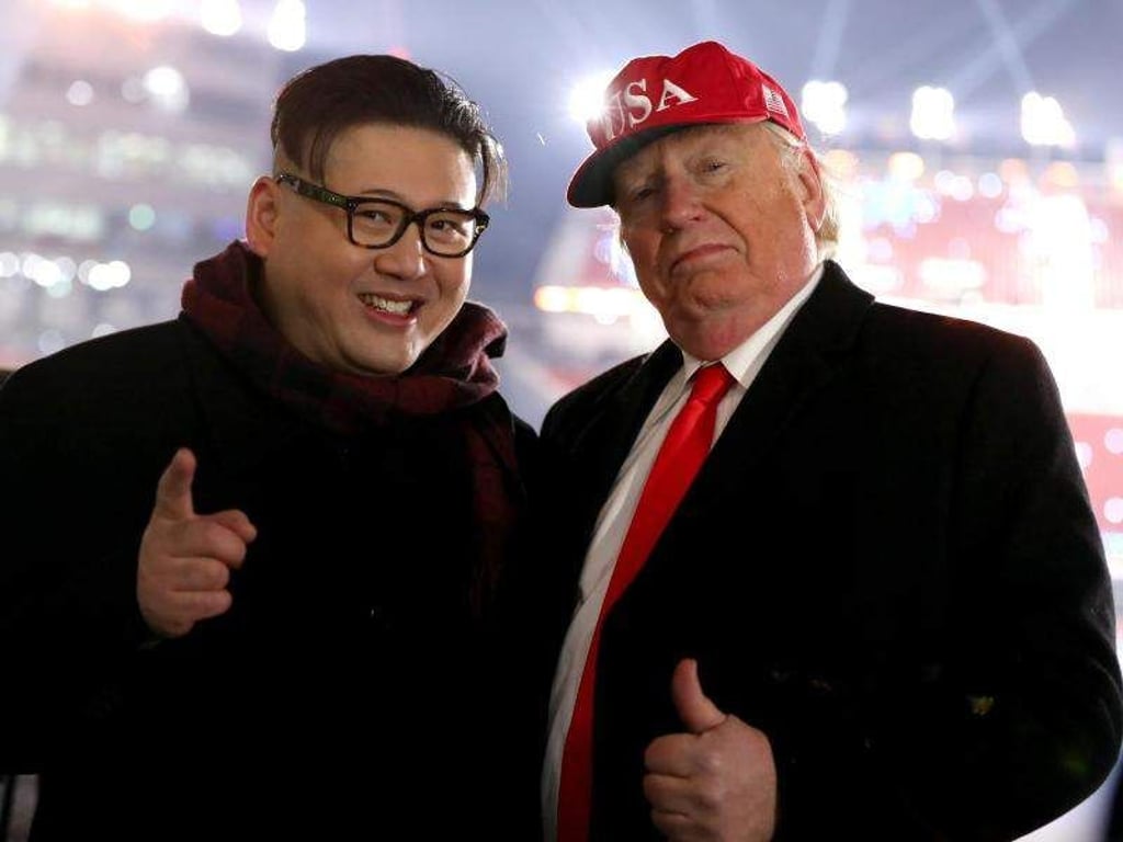 Doppelgänger von US-Präsident Donald Trump und dem nordkoreanischen Machthaber Kim Jong Un sorgten bei der Eröffnungsfeier für Wirbel. Foto: Mike Egerton
