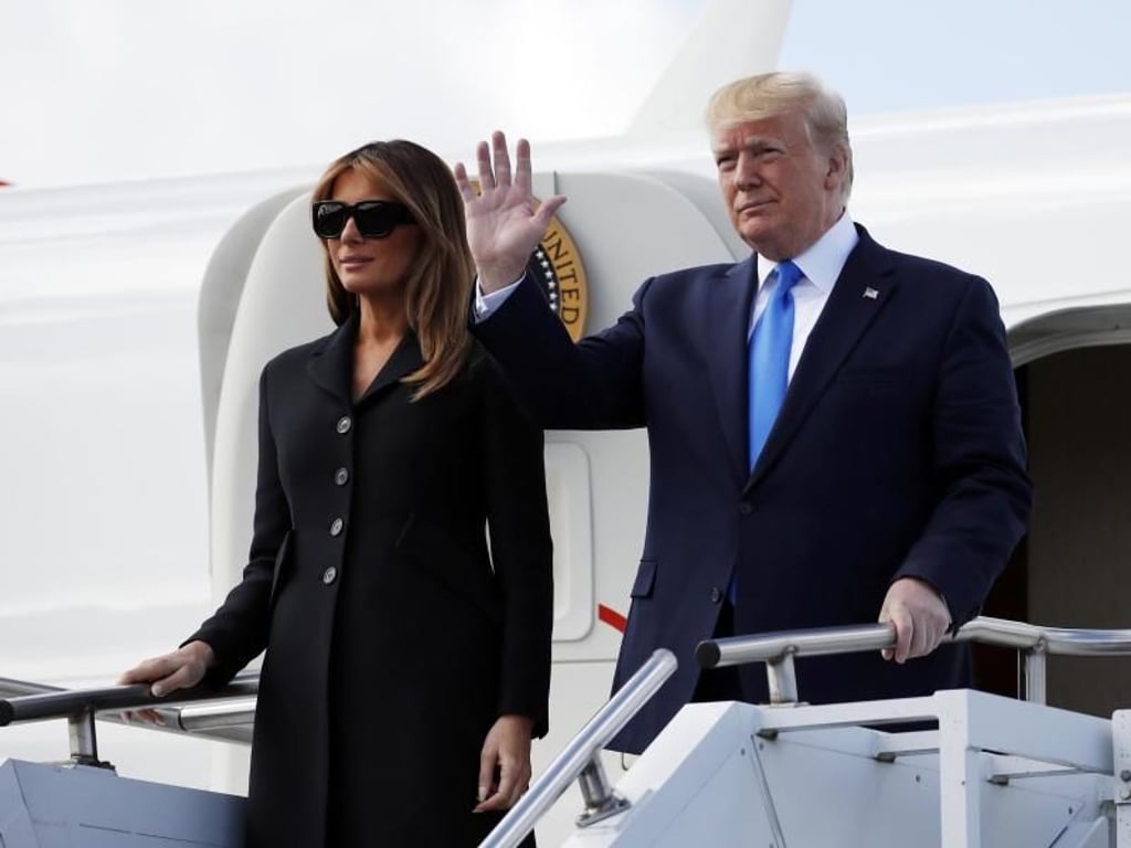 US-Präsident Donald Trump und seine Frau Melania treffen am Flughafen von Caen ein. Foto: Alex Brandon/AP