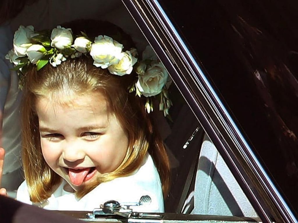 Die kleine Prinzessin Charlotte streckt einfach mal ihre Zunge heraus. Foto: Andrew Milligan/POOL PA/AP