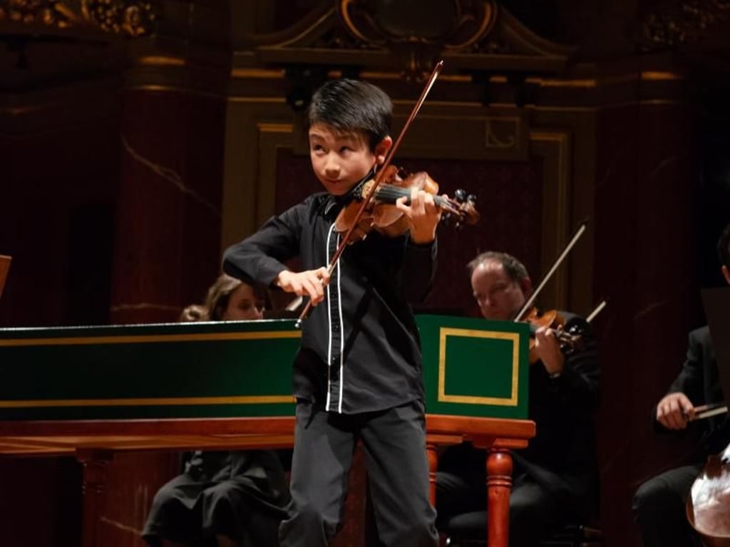 Der 10-jährige Christian Li aus Australien beim Menuhin-Geigenwettbewerb in Genf Foto: Olivier Miche