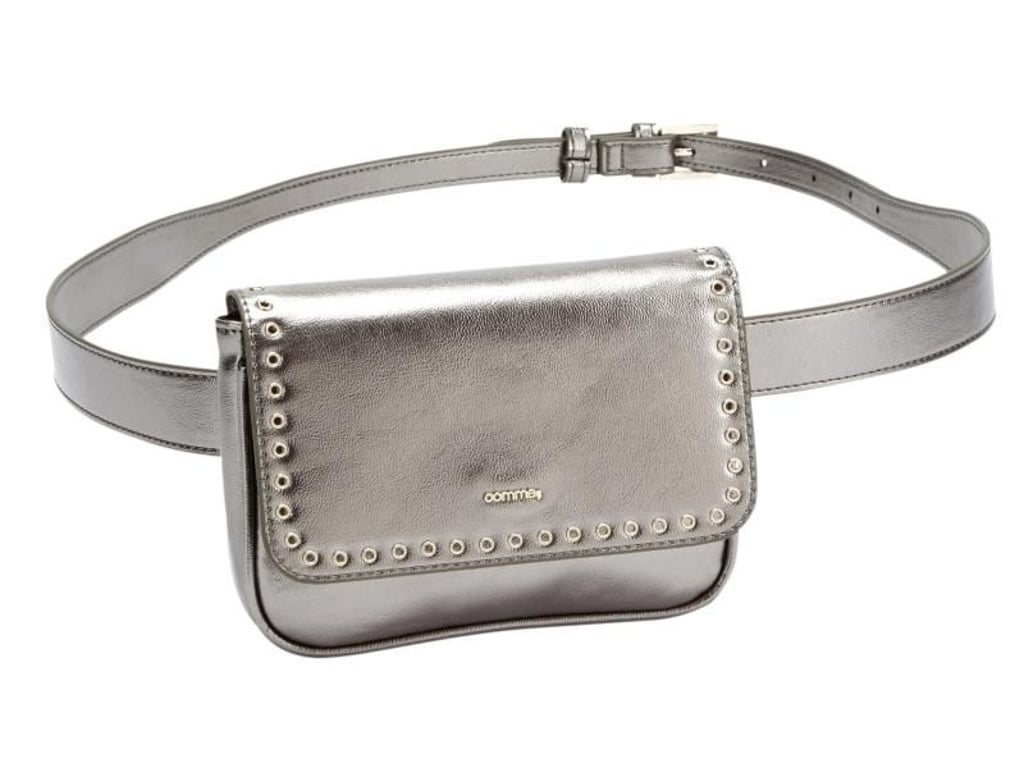 Sie ist tatsächlich zurück, aber in neuem Outfit: Bauchtaschen sind alltagstauglich geworden. Comma hat zum Beispiel ein elegantes Modell in Silber im Programm (ca. 50 Euro). Foto: Comma/dpa