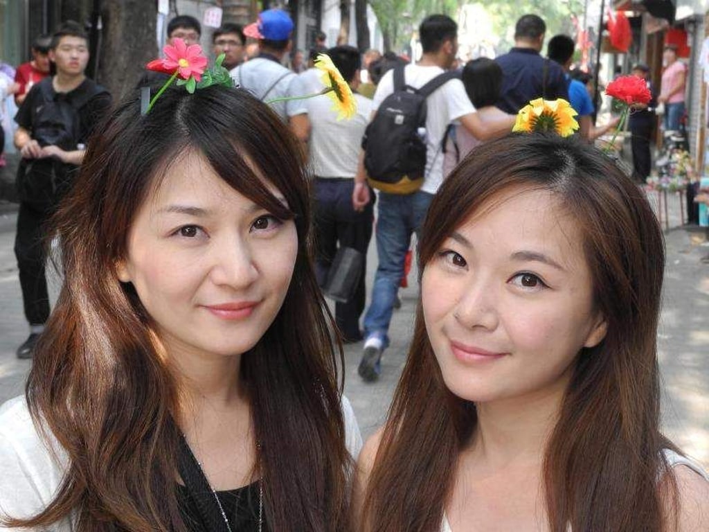 Blumenkinder in der Altstadt von Peking. Foto: Jörn Petring