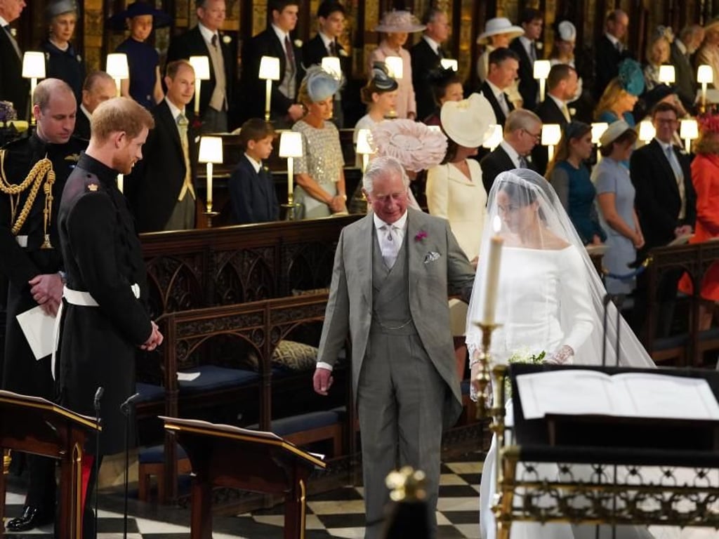 Meghans Vater Thomas Markle konnte wegen Herzproblemen nicht zur Hochzeit kommen. Für ihn sprang Prinz Charles ein, der die Braut zum Altar führte. Foto: Jonathan Brady/PA Wire