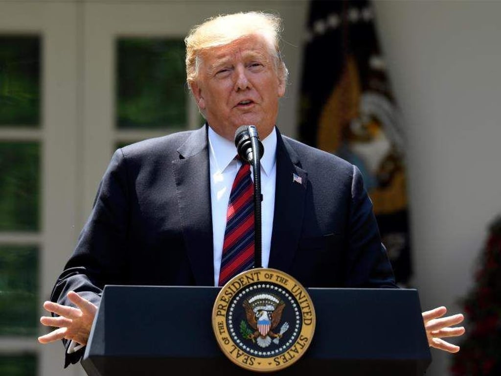 Donald Trump spricht im Rosengarten des Weißen Hauses. Foto: Susan Walsh/AP