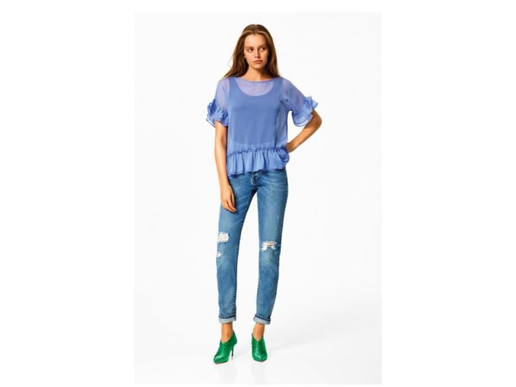 Volants müssen passend zur eigenen Figur eingesetzt werden. Wer eine schmale Taille und schlanke Oberarme hat, dem steht dieser Look von mbyM (Hose ca. 100 Euro, Shirt ca. 60 Euro). Foto: mbyM/dpa