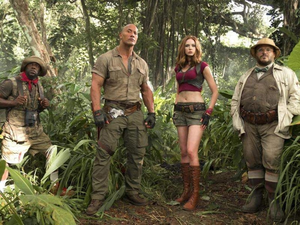 Kevin Hart (als Moose Finbar, l-r) , Dwayne Johnson (als Dr. Smolder Bravestone), Karen Gillan (als Ruby Roundhouse) und Jack Black (als Professor Shelly Oberon). Foto: Sony Pictures
