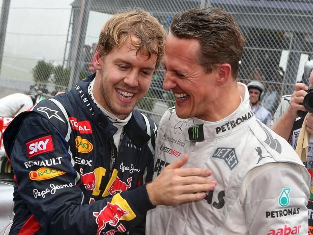 Sebastian Vettel (l) und Michael Schumacher Jahre 2012. Foto: Jens Büttner