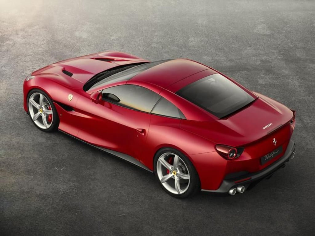 Der neue Ferrari Portofino geht mit einem Hardtop anstelle eines Stoffverdecks an den Start. Foto: Ferrari/dpa-tmn