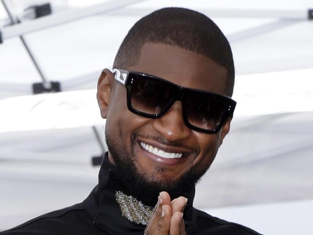 Usher strahlt vor Glück. Foto: Paul Buck