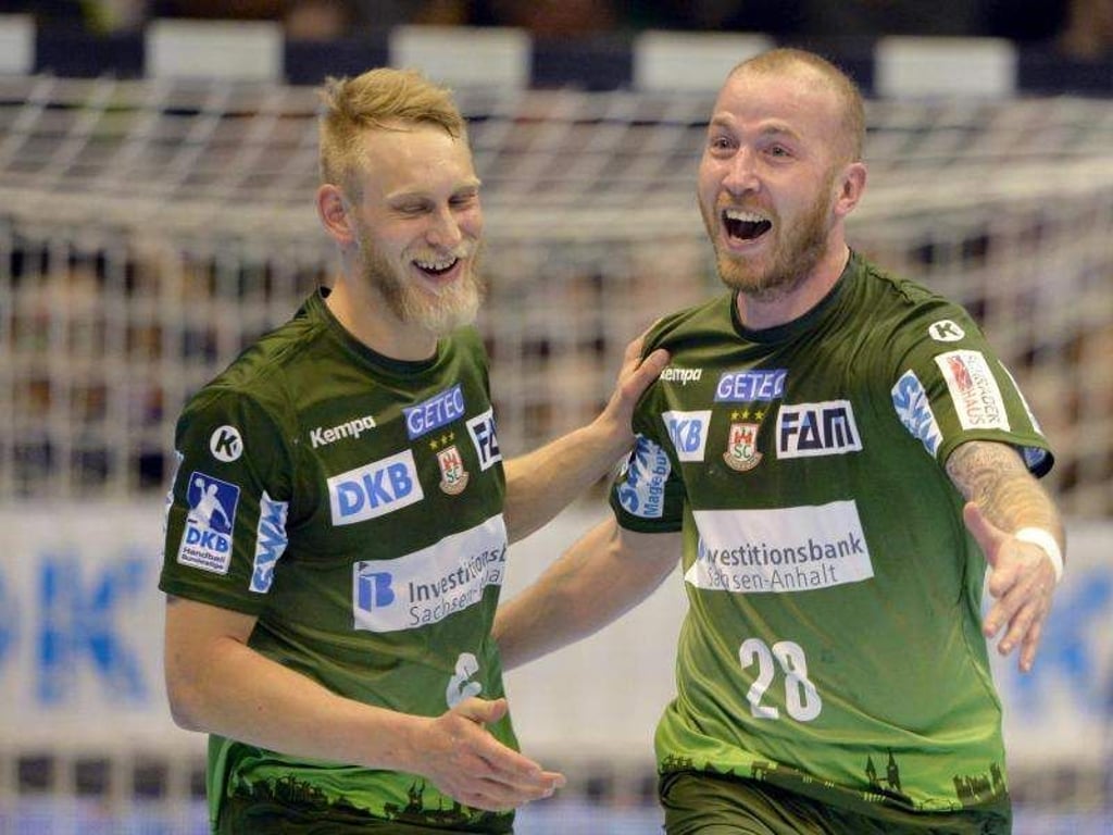 Matthias Musche (l.) und Robert Weber (r.) jubeln. Foto: Jan Kuppert/Archiv