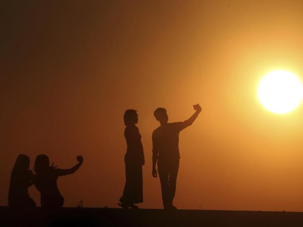 Naypyidaw in Myanmar - der letzte Sonnenuntergang im Jahr 2018. Foto: Aung Shine Oo/AP
