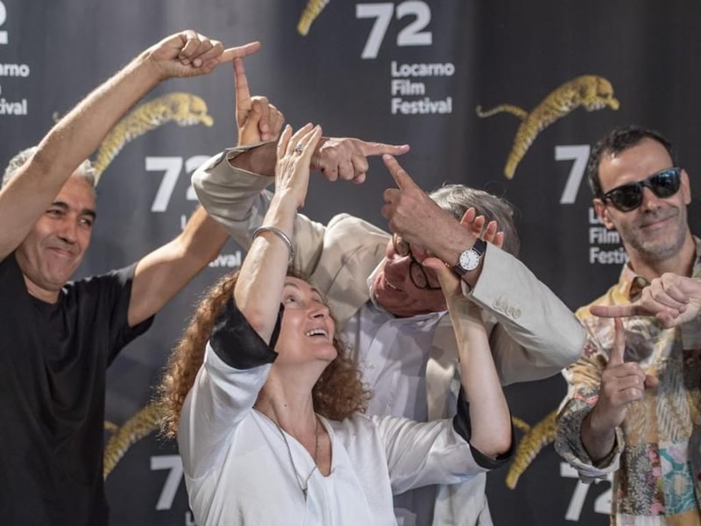 Produzent Luis Urbano (l-r), Schauspielerin Luisa Cruz, Schauspieler Miguel Lobo Antunes und Regisseur João Nicolau stellen ihre melancholische Ballade «Technoboss» in Locarno vor. Foto: Urs Flueeler/Keystone