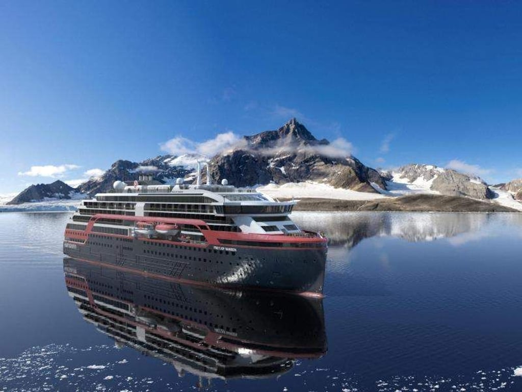 So soll die «Fridtjof Nansen» von Hurtigruten einmal aussehen - insgesamt plant die Reederei drei neue hybridbetriebene Expeditionskreuzfahrtschiffe. Der nun angekündigte, noch namenlose Neubau soll 2021 fertig werden. Foto: Hurtigruten