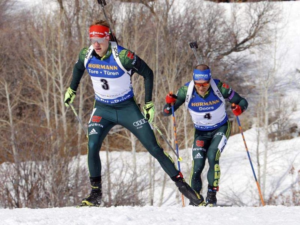 Die deutschen Biathleten Roman Rees (l) und Erik Lesser (r). Foto: Rick Bowmer/AP