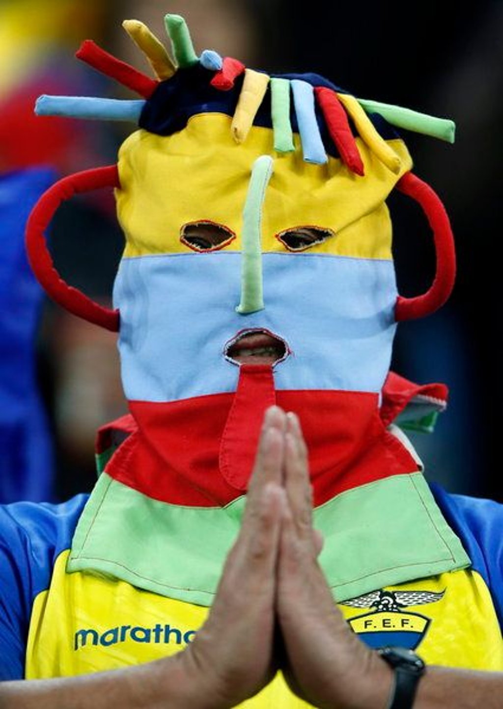 epa04269950 Ecuador soccer fan during the FIFA World Cup 2014 group E preliminary round match between Honduras and Ecuador at the Arena da Baixada in Curitiba, Brazil, 20 June 2014. (RESTRICTIONS APPLY: Editorial Use Only, not used in association with any commercial entity - Images must not be used in any form of alert service or push service of any kind including via mobile alert services, downloads to mobile devices or MMS messaging - Images must appear as still images and must not emulate match action video footage - No alteration is made to, and no text or image is superimposed over, any published image which: (a) intentionally obscures or removes a sponsor identification image; or (b) adds or overlays the commercial identification of any third party which is not officially associated with the FIFA World Cup) EPA/RUNGROJ YONGRIT EDITORIAL USE ONLY +++(c) dpa - Bildfunk+++