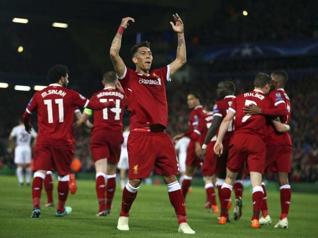 Auch Roberto Firmino (M) macht gegen die Römer einen Doppelpack klar: 5:0. Foto: Dave Thompson/AP