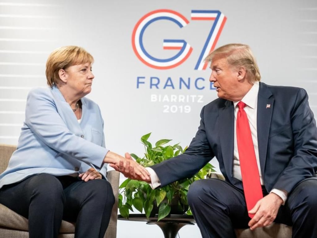 Merkel und Trump bei bilateralen Gesprächen am Rande des G7-Gipfels. Foto: Michael Kappeler