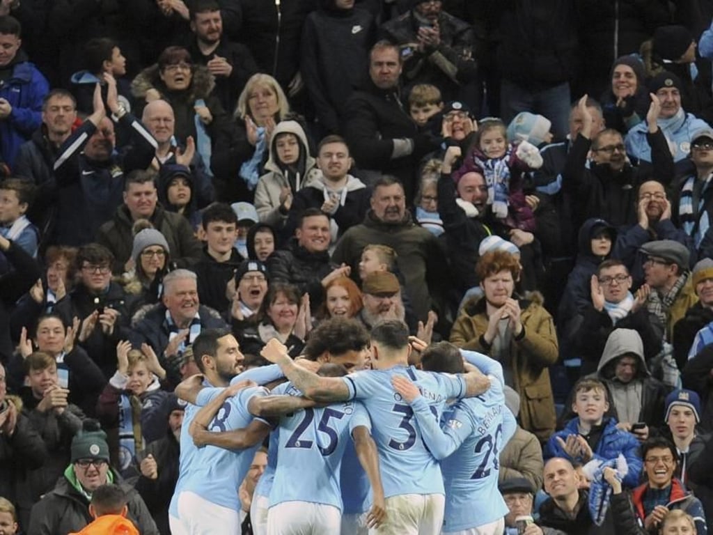 Manchester Citys Spieler jubeln nach dem zweiten Tor für ihre Mannschaft. Foto: Rui Vieira/AP