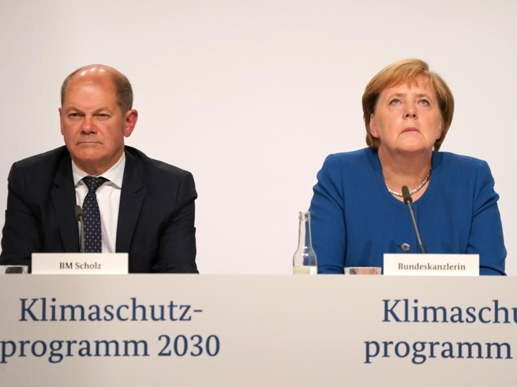 Kanzlerin Angela Merkel und Finanzminister Olaf Scholz bei der Pressekonferenz nach der Sitzung des Klimakabinetts. Foto: Kay Nietfeld