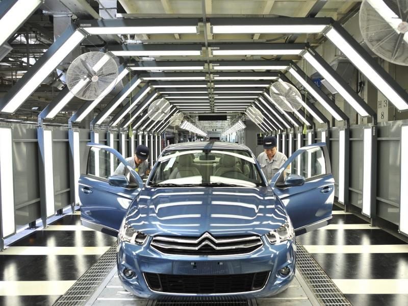 Produktion beim französischen Autobauer PSA Peugeot Citroen in China. Foto: Shepherd Zhou