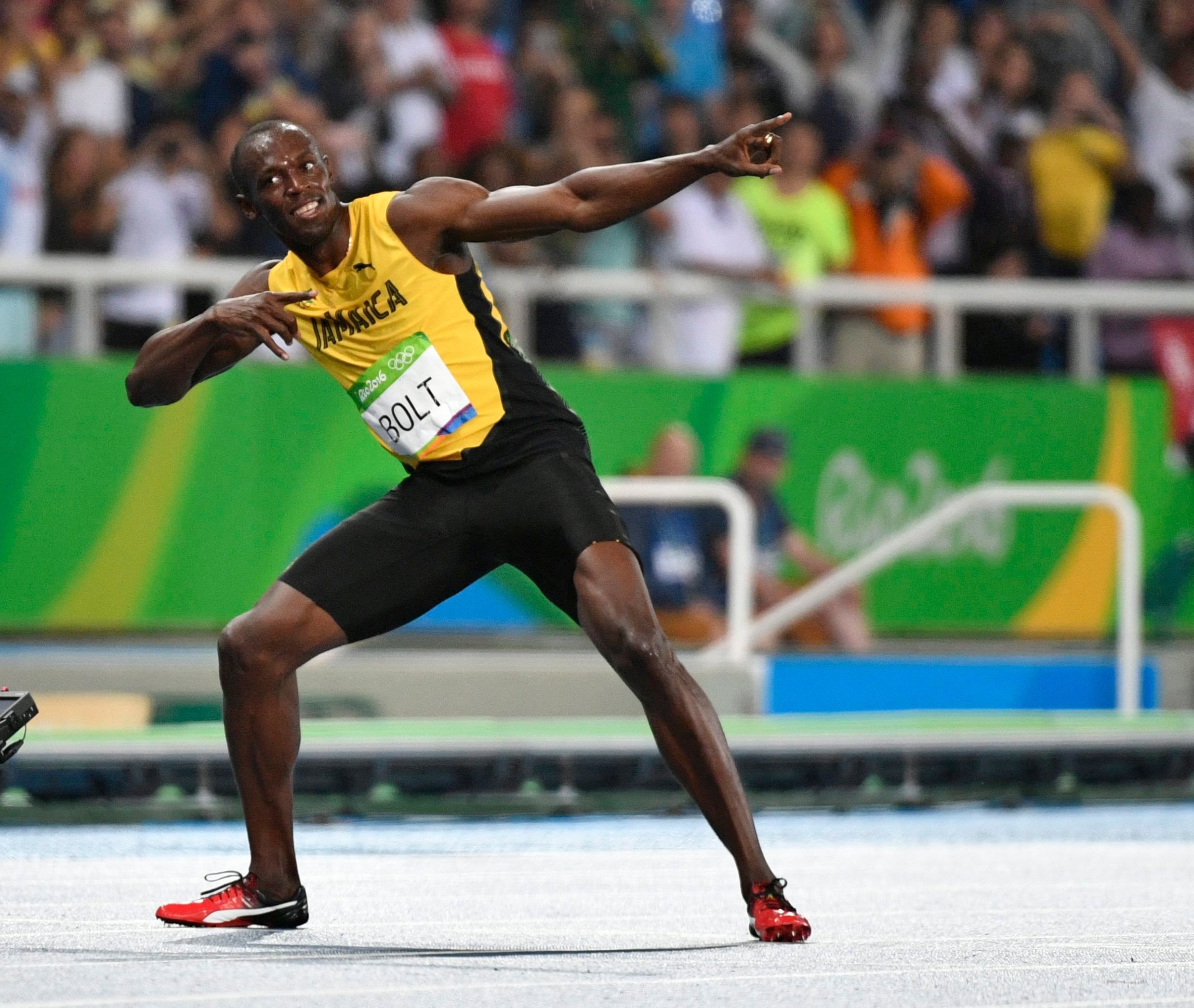 Usain Bolt in seiner berühmten Pose.