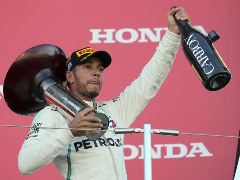 Titelverteidiger Lewis Hamilton kann den nächsten WM-Titel fast schon einplanen. Foto: Ng Han Guan/AP
