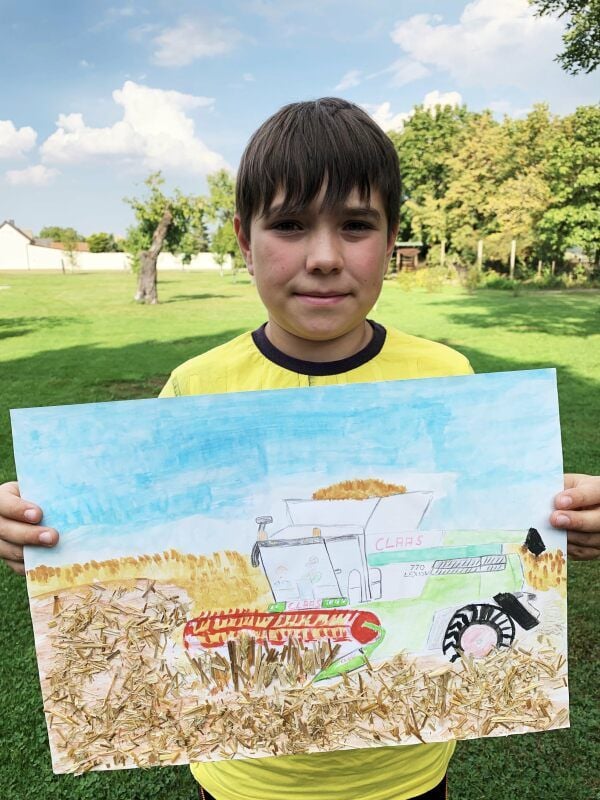 Max hat einen Mähdrescher gemalt.