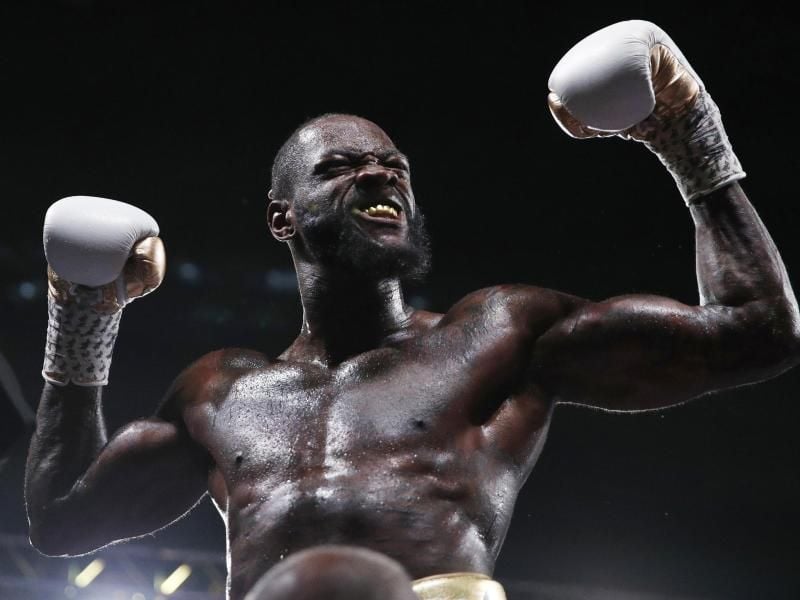 Feierlaune: Deontay Wilder bleibt Boxweltmeister im Schwergewicht. Foto: John Locher/AP/dpa