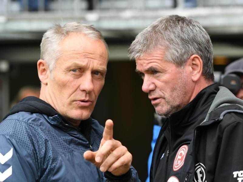 Die beiden Trainer Christian Streich und Friedhelm Funkel sind sich in ihrer Kritik am Videobeweis einig. Foto: Patrick Seeger