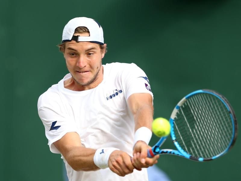 Ein drohendes Aus gegen den Kroaten Ivo Karlovic konnte Jan-Lennard Struff noch abwenden - jetzt geht es gegen Roger Federer. Foto: Steven Paston/PA Wire