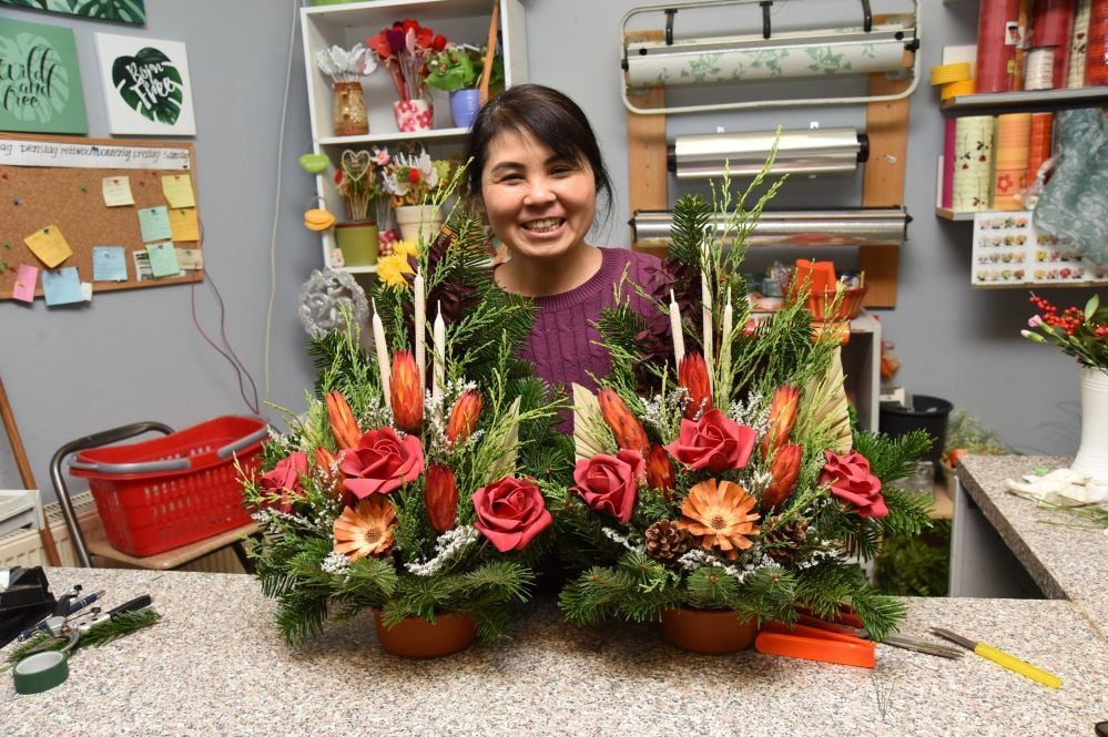 Vu Van Thanh ist im Blumenladen auf Totensonntag eingerichtet. Den Gedenktag lernet sie erst in Deutschland kennen.
