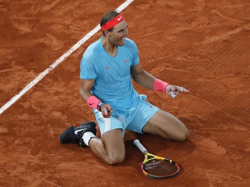 Rafael Nadal feiert seinen Sieg über Novak Djokovic im Finale der French Open. Foto: Christophe Ena/AP/dpa