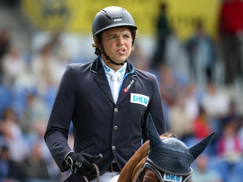 Springreiter Andreas Kreuzer auf seinem Pferd Calvilot. Foto: Friso Gentsch