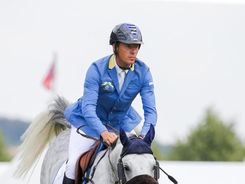 Der deutsche Reiter Christian Ahlmann ritt auf seinem Pferd Clintrexo beim Großen Preis von Berlin auf Rang zwei. Foto: Rolf Vennenbernd