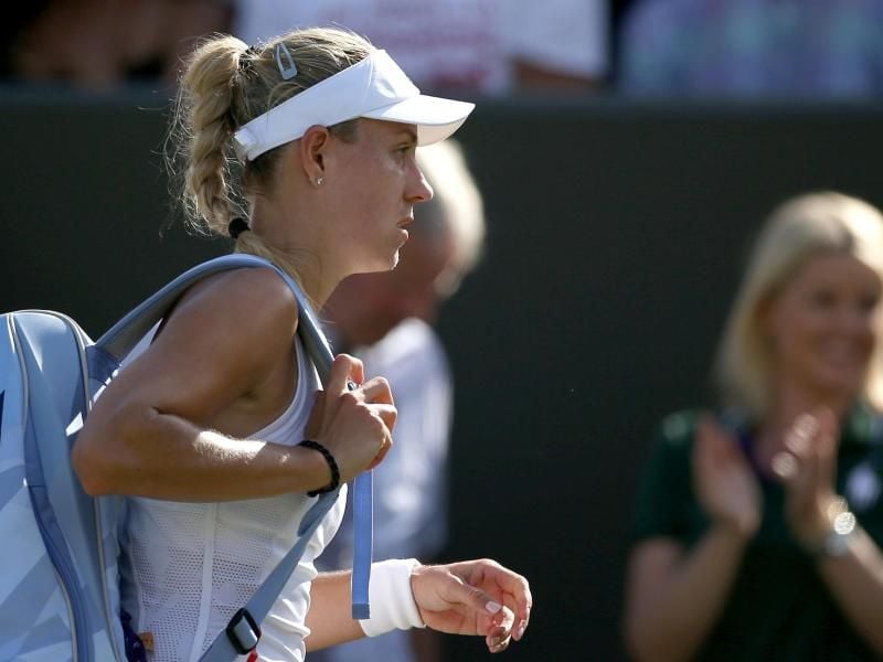 Nix wie weg: Angelique Kerber verlässt nach dem Aus in Wimbledon rasch den Platz. Foto: Steven Paston/PA Wire