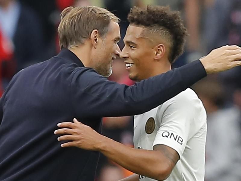 PSG-Trainer Thomas Tuchel und sein Spieler Thilo Kehrer sind französischer Meister. Foto: Michel Euler/AP