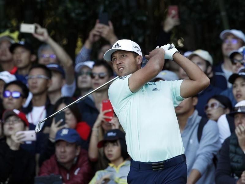 Schlägt beim Golf-Turnier in Winsen an der Luhe ab: US-Star Xander Schauffele. Foto: Ng Han Guan/AP