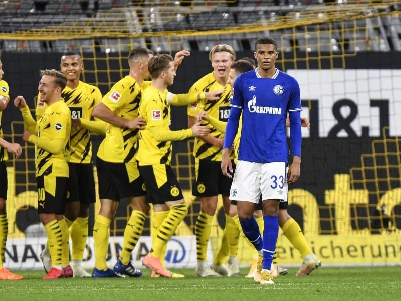 Jubel beim BVB, Frust bei Schalke nach dem Revierderby in Dortmund. Foto: Martin Meissner/AP-Pool/dpa