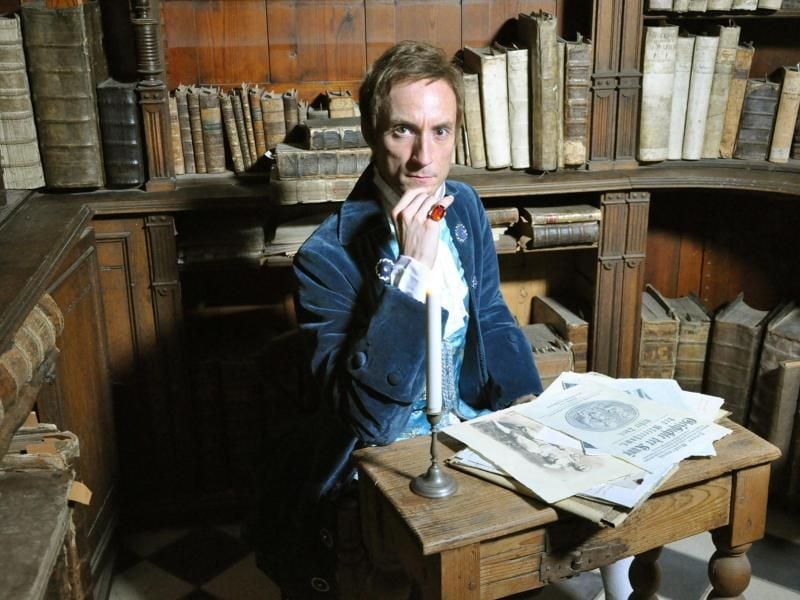 Johann Winckelmann (Jonas Müller-Liljeström) in der Bibliothek des Reichsgrafen von Bünau. Foto: Christel Fromm