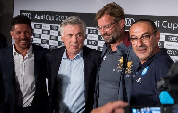 Diego Simeone von Madrid, Carlo Ancelotti von München, Jürgen Klopp von Liverpool und Maurizio Sarri von Neapel (l-r) in München vor Beginn des Audi Cup.