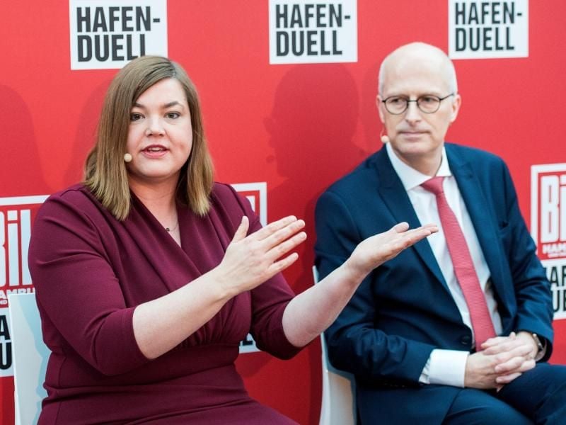 Katharina Fegebank (Grüne) und Peter Tschentscher (SPD). Foto: Daniel Bockwoldt/dpa