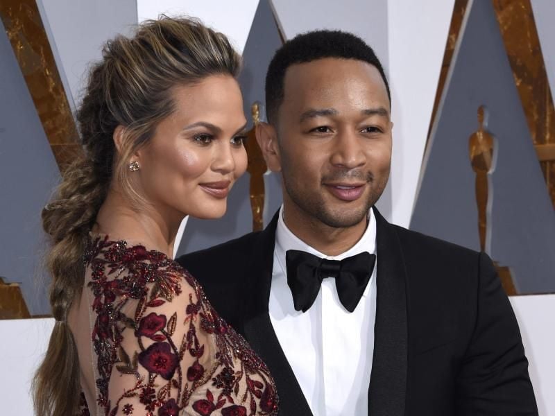 Der US-Sänger John Legend und das Model Chrissy Teigen. Foto: Paul Buck/EPA/dpa