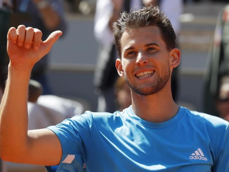 Bietet - nicht ganz im Ernst - Serena Williams ein gemeinsames Mixed an: Tominic Thiem. Foto: Michel Euler/AP