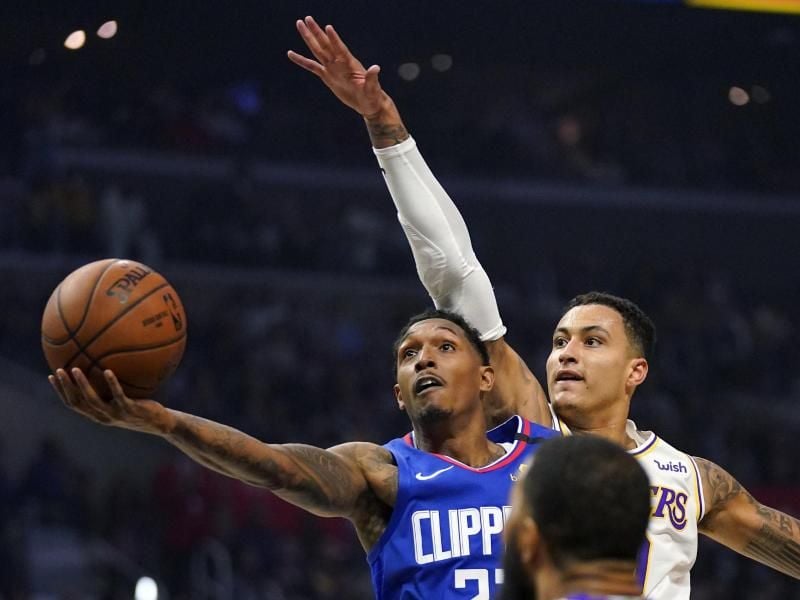 Lou Williams (l) von den Los Angeles Clippers droht eine Strafe. Foto: Mark J. Terrill/AP/dpa