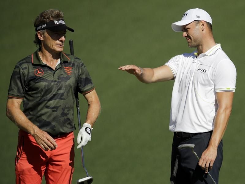 Verstehen sich: Bernhard Langer (l) und Martin Kaymer. Foto: Charlie Riedel/AP