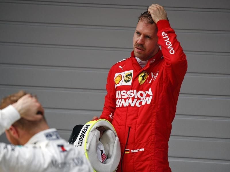 Skeptisch: Ferrari-Pilot Sebastian Vettel nach Platz drei in Shanghai. Foto: Andy Wong/AP