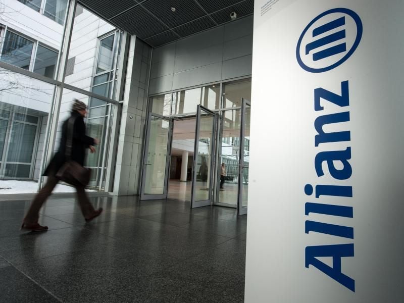 Für Allianz steht unter dem Strich ein Überschuss von fast 2,1 Milliarden Euro. Foto: picture alliance / Armin Weigel/dpa